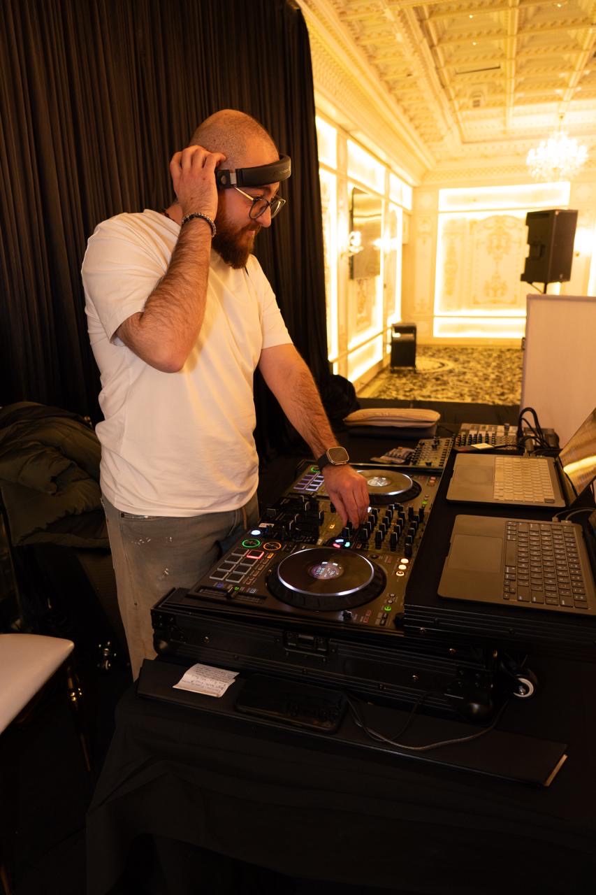 DJ Mishoo playing at a ballroom event in Calgary